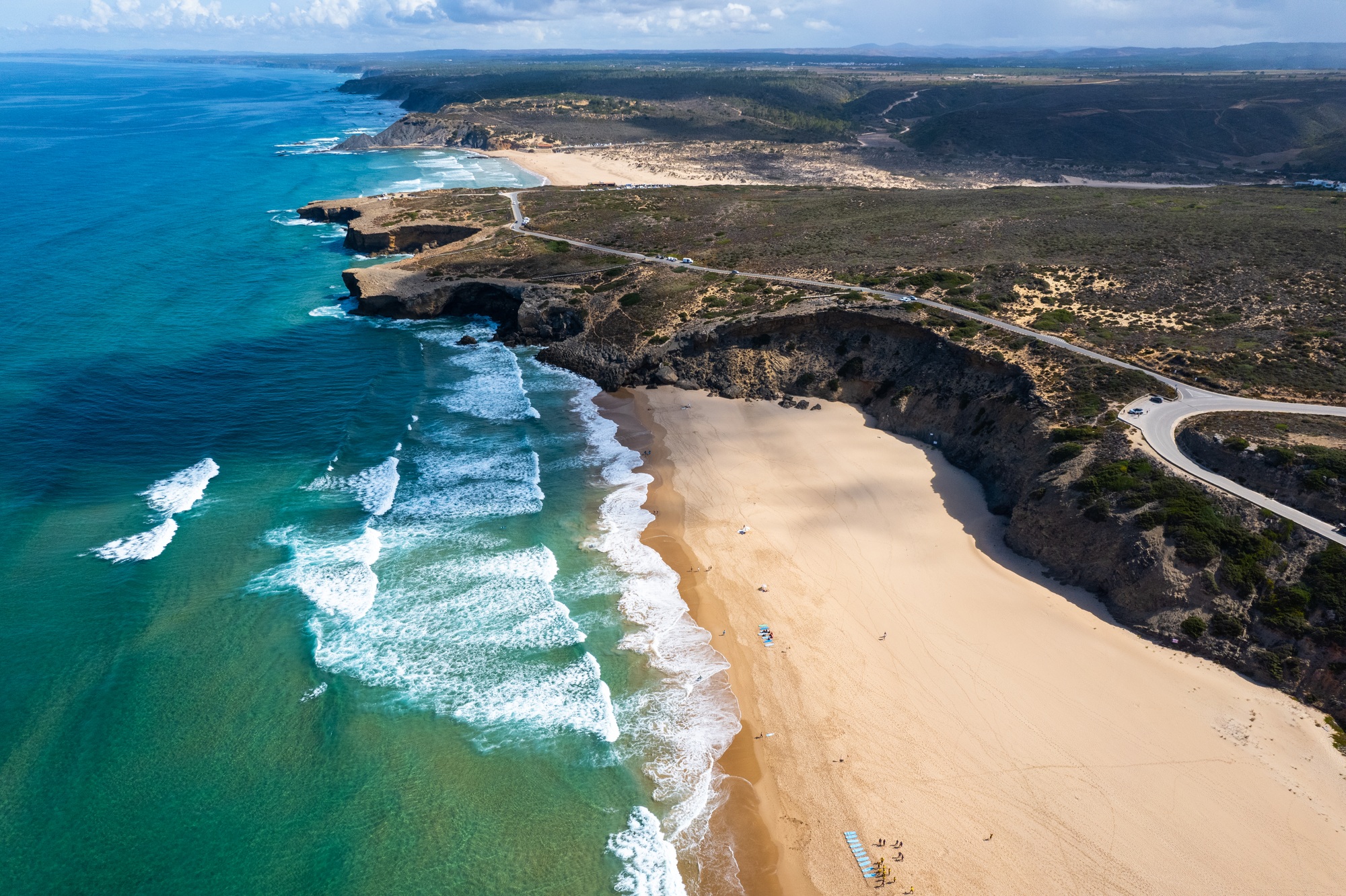 Algarve Coast in Portugal. Aerial drone view over sandy beach and Atlantic Ocean